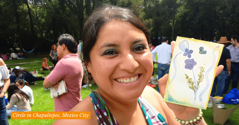 Woman holding a watercolor painting