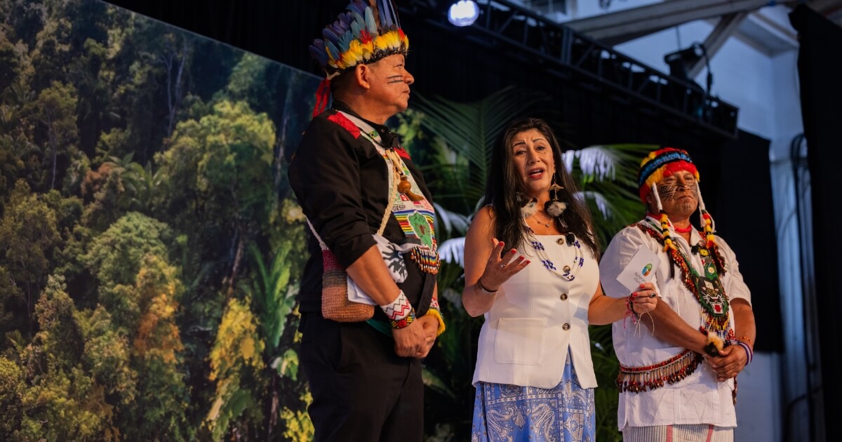  Atossa invites everyone in the room to join them in their cause to protect the Amazon.