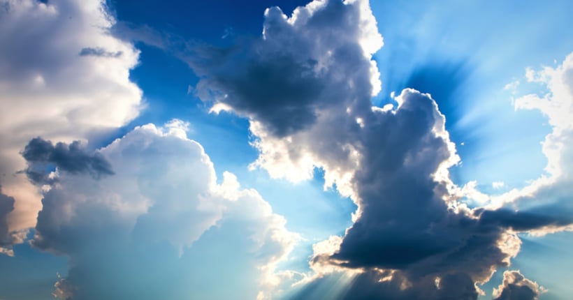 Clouds in the sky with the sun shining through