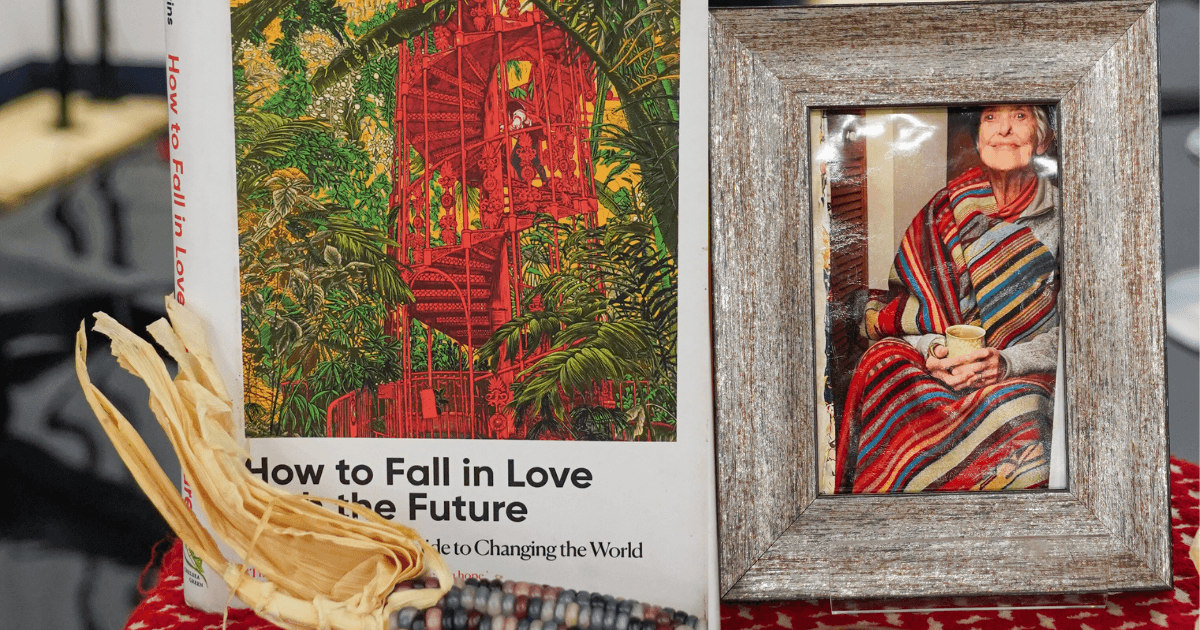  Rob Hopkin’s book “How to Fall in Love with the Future” and an picture frame of Joannna Macy