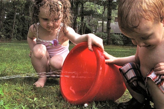 Kids_Playing_Bucket_Water_Flickr_by_The_Paessels