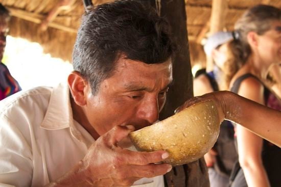Sarayaku man drinking chicha